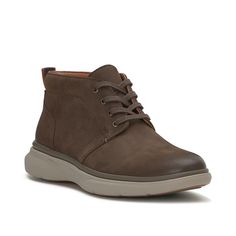 Vince Camuto-Tadesse Chukka Boot With a classic style made to pair well with a favorite professional or semi-formal fit, the Tadesse chukka boot is a great add to your wardrobe. The Flex 365 Technology keeps you extra comfortable thanks to its supportive cup sole, cushioned energy-returning midsole, and removable performance insole using KulKote® temperature regulating technology. Classic Brown Chukka Boots For Work, Classic Brown Waterproof Boots For Fall, Brown Round Toe Chukka Boots For Business Casual, Brown Chukka Boots For Business Casual, Classic Brown Plain Toe Boots, Casual Moc Toe Boots For Business Casual, Business Casual Brown Boots With Rubber Sole, Classic Round Toe Waterproof Boots For Work, Classic Waterproof Boots With Round Toe For Work