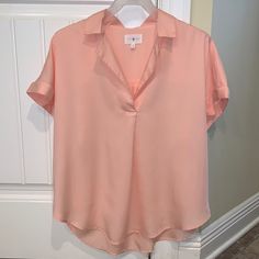 Nwot Women’s Peach V Neck Collared Shirt, Soft Cotton, Lays So Cute On While Wearing, Flattering, Cuffed Sleeves, Never Worn Peach V-neck Summer Blouse, Summer Peach V-neck Blouse, Peach Short Sleeve Summer Blouse, Peach Short Sleeve Blouse For Summer, Peach Short Sleeve Shirt For Summer, Chic Short Sleeve Peach Blouse, Casual Peach Summer Shirt, Summer V-neck Peach Blouse, Pink Feminine V-neck Shirt