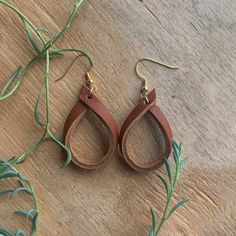 Leather Hoop Earrings – Haute JS Design Folded Leather Earrings, Leather Earrings Diy How To Make, Leather Strip Earrings, Leather Earring Patterns Free, Crafts With Leather Scraps, Leather Diy Earrings, Braided Leather Earrings Diy, Homemade Leather Earrings, Simple Leather Earrings