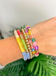 Elevate your summer style with our Shimmer Summer Stack Bracelet Set. This set of colorful bracelets is perfect for adding a fun and vibrant touch to any outfit. Expertly crafted with shimmering details, they are sure to make a statement. Make your summer shine with this must-have accessory. Stack Bracelet, Colorful Bracelets, Personalized Products, Bracelet Stack, Bracelet Set, Summer Style, Deodorant, Summer Fashion, Beaded Bracelets