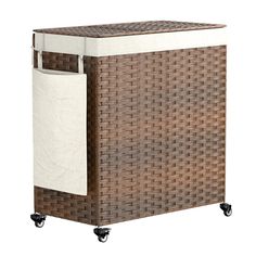 a brown wicker laundry hamper on wheels with a white canvas cover over the top