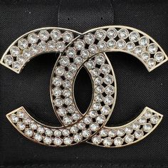 Chanel 2023 Summer Collection Large Logo Brooch Gold Tone Crystals All Over Comes With Chanel Box Luxury Silver Rhinestone Brooches, Luxury Silver Brooches With Rhinestones, Designer White Brooches For Formal Occasions, Luxury Rhinestone Brooches For Formal Occasions, Luxury Rhinestone Brooch For Formal Occasions, Chanel 2023, Chanel Brooch, Chanel Camellia, Jewelry Chanel