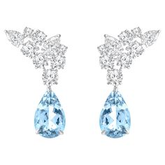 Inspired by the JOY of experiencing a gushing waterfall, these stunning earrings from the Cascade Collection feature mixed rose cut colorless diamonds and drops of aquamarine. These dressy earrings are perfect for the festive season! Wear these with a sparkly sequin dress. Accompanied with a total of 5 1/3 Carat gemstones, these earrings will be delivered in a HARAKH jewelry box along with a HARAKH authentication certificate and a reflection card. Drawing from a century of expertise in the diamond and jewelry industry, HARAKH was launched in 2017, to introduce the finest gemstones and the most exceptional craftsmanship for discerning jewelry collectors globally. All our precious stones are responsibly sourced and less than 0.5% of the world's gemstones will make the HARAKH grade and standa Luxury Light Blue Fine Jewelry Earrings, Sparkly Sequin Dress, Lux Jewelry, Dressy Earrings, Diamond Chandelier Earrings, Diamond Chandelier, Luxe Jewelry, Aquamarine Earrings, Pear Cut Diamond