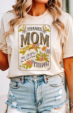 Our "Thank Mom For Everything Shirt" is a touching tribute to the endless love and sacrifices of motherhood. Adorned with a beautiful floral design and the heartfelt message "Thank Mom For Everything," this shirt is the perfect birthday gift, Mother's Day gift, or token of appreciation for the incredible mom in your life. Whether she prefers a cozy sweatshirt or a stylish tee, this Comfort Colors Mama Shirt is sure to make her feel cherished and loved. 🌸 Charming Floral Design: Featuring delica Mother's Day Graphic Tee Tops As Gift, Mother's Day Graphic Tee T-shirt Gift, Mother's Day Gift Graphic Tee T-shirt, Mother's Day Gift Tops With Text Print, Mother's Day Gift Cotton T-shirt, Slogan T-shirt For Birthday And Mother's Day, Mother's Day Gift Graphic Tee, Mother's Day Gift Tops With Letter Print, Mother's Day Letter Print Tops Gift