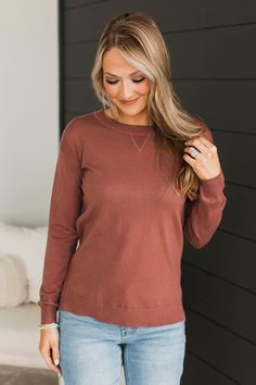 Fit & Details: True to size with great stretch. Soft, lightweight knit material Crew neckline Ribbed knit detailing along hems Small side slits Measurements: X-Small: Bust 38" Length 25" Small: Bust 40“ Length 25.5“ Medium: Bust 42“ Length 26“ Large: Bust 44“ Length 26.5“ X-Large: Bust 46“ Length 27“ Fabric & Material Care: Machine wash cold on delicate. Lay flat to dry. 55% Viscose, 45% Nylon. *Imported* Model Info: Leah is modeling a large. Mack is modeling an x-small. Stretch Solid Color Crew Neck Sweater, Stretch Soft Knit Top For Layering, Solid Knit Top With Ribbed Cuffs For Layering, Stretch Knit Top With Ribbed Neckline, Stretch Crew Neck Knit Top For Loungewear, Stretch Sweater With Ribbed Neckline For Loungewear, Stretch Knit Top With Crew Neck, Solid Stretch Knit Top With Crew Neck, Stretch Cotton Sweater In Solid Color