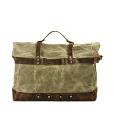 Experience the exceptional quality of our waxed cotton canvas duffle, paired with luxurious Crazy Horse leather. Available in khaki, light green, and black, this bag combines vintage charm with durability. Each color option reflects your personal style while promising resilience on every journey. Built for the Modern Traveler Sized at 48 cm x 35 cm x 20 cm and with a 33.5-liter volume, this duffle fits easily in overhead compartments while providing ample space for your essentials. Weighing just Waxed Canvas Duffle Bag, Vintage Travel Accessories, Tactical Wallet, Weekend Duffle Bag, Fishing Shoes, Canvas Duffle Bag, Waxed Canvas Bag, Fish In A Bag, Canvas Messenger Bag