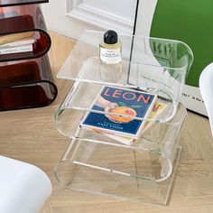 a glass table with a magazine on it