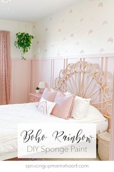 a bedroom with pink walls and white bedding