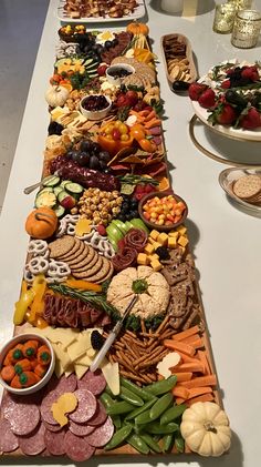 a long table filled with lots of different types of food