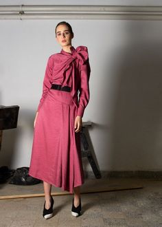 Flowy, asymmetrical cut midi dress with side tie detail, and elastic black belt detail at waist (fabric: viscose/ polyester blend) Elegant Pink Maxi Dress With Asymmetrical Hem, Chic Asymmetrical Workwear Dress, Knee-length Midi Dress With Tie Waist For Party, Long Sleeve Dresses With Tie Sleeves For Daywear, Pink Long Sleeve Dress For Office, Pink Long Sleeve Office Dress, Pink Midi Length Long Sleeve Party Dress, Spring Workwear Midi Dress With Asymmetrical Skirt, Long Sleeve Asymmetrical Dress For Spring Workwear