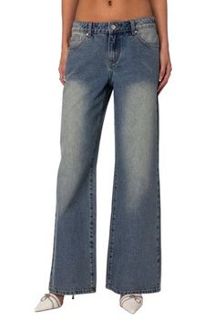 These Y2K-inspired nonstretch jeans sit low on the waist and flare into floor-sweeping wide legs, creating a trendy look that can be styled up or down. Zip fly with button closure Five-pocket style 100% cotton Machine wash, dry flat Imported Casual Cotton Flares With Frayed Hem, Casual Full-length Blue Flares, Casual Blue Full-length Flares, Casual Blue Full Length Flares, Casual Full Length Blue Flares, High Waist Distressed Flare Jeans In Washed Blue, High Waist Distressed Washed Blue Flare Jeans, Distressed Blue Flare Jeans, Trendy Distressed Wide Leg Flares