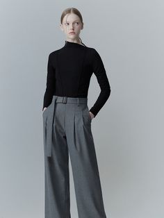 Editor's Notes This trouser from RE RHEE combines the element of a smart tailoring and a practical design that features a detachable waist belt and pintuck detail front in a semi-high rise. Its silky finish and wide leg silhouette make your legs elongated with a wrinkle resistant fabric. It is an easy piece to dress up or down. - Trouser with a detachable waist belt - Warm and flowy finish, wide leg fit in a full length, and a semi-high rise- Two pintuck detail at the front and si Belted Fitted Wide Leg Pants For Work, Fitted Belted Wide Leg Pants For Work, Elegant Tailored Belted Pants, Fall Workwear Belted Wide Leg Pants, Fall Wide Leg Belted Pants For Work, Classic Fitted Bottoms With Belt Detail, Elegant Wide Leg Pants With Belted Cuffs, Modern Belted Bottoms For Workwear, Modern Wide Leg Pants With Belt Loops For Fall