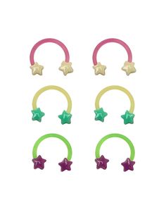 four pairs of hair rings with stars on them, one is green and the other is pink