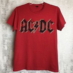 AC/DC Logo Women’s Tee Shirt Red Cotton Size Small  | eBay Red Band Logo T-shirt, Retro Pre-shrunk Red Shirt, Red Band Merch T-shirt Pre-shrunk, Red Pre-shrunk Band Merch T-shirt, Red Cotton Band Merch Top, Red Band Merch T-shirt With Letter Print, Red Cotton Shirt With Letter Print, Red T-shirt With Band Logo For Fans, Red Letter Print T-shirt Band Merch