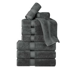 a stack of gray towels folded on top of each other