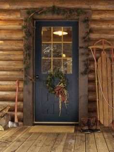 Rustic Cabin Christmas Door Photography Backdrop - Rustic Christmas photography backdrop featuring a cozy cabin door with a festive wreath and vintage sled for holiday photoshoots. Log Cabin Christmas Decor, Rustic Cabin Exterior, Cabin Front Door, Cabin Christmas Decor, Log Cabin Christmas, Rustic Front Door, Cabin Doors, Black Front Doors, Holiday Greenery