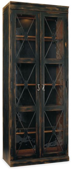 an old wooden bookcase with glass doors on the front and bottom shelves is shown