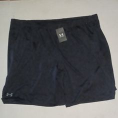 Under Armour Training Shorts Loose Fit Color-Black New With Tags Under Armour Black Workout Bottoms, Under Armour Black Shorts With Elastic Waistband, Under Armour Black Shorts With Built-in Shorts, Under Armour Black Workout Shorts, Under Armour Black Stretch Athletic Shorts, Under Armour Casual Black Shorts, Black Stretch Athletic Shorts By Under Armour, Casual Black Under Armour Shorts, Black Athletic Shorts With Pockets And Short Inseam