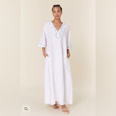 Brand New With Tags - Kaftan Style Linen Dress. Featuring A V-Neck Detail, 3/4 Sleeves With A Detachable Belt, And Signature Fanm Mon Floral Embroidery. 100% Linen Kaftan Dress Relaxed Fit V Neck With Neck Embroidery Back Button Closure 3/4 Sleeves With Detachable Belt Detachable Tie Belt For Waist Cinching Embroidery Detail On Sleeves And Trim Length: 130 Cm White 3/4 Sleeve Maxi Dress For Vacation, White Maxi Dress With 3/4 Sleeves For Vacation, Vacation White Maxi Dress With 3/4 Sleeve, White V-neck Kaftan For Spring, White Split Neck Dress For Spring, White V-neck Dress For Spring, White Maxi-length V-neck Beach Dress, White Maxi V-neck Dress For Beach, Elegant White Kaftan For Daywear