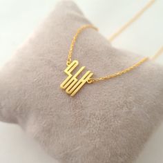 This necklace is a piece of our new collection of Allah necklace made from sterling silver and 14k gold. The collection includes different designs that suit all tastes Kufi/calligraphy, heart/rectangle/triangle shapes, tiny/big sizes. Here is the link for the full collection: https://etsy.me/2Swd0lPAll the designs can be made as necklace, bracelet, and earrings. If you also want a complete set that includes a necklace, a bracelet and earrings please get in touch with us. We accept custom orders! Gold Sterling Silver Initial Necklace For Her, Gold Initial Pendant Necklace As Gift For Mom, Gold Sterling Silver Initial Necklace As Gift For Her, Minimalist Gold Custom Necklace For Mother's Day, Gold Initials Jewelry As A Gift For Mom, Yellow Gold Initials Necklace Gift For Mom, Dainty Monogram Necklace As Gift, Dainty Monogram Necklace For Gift, Dainty Monogram Necklace For Gifts