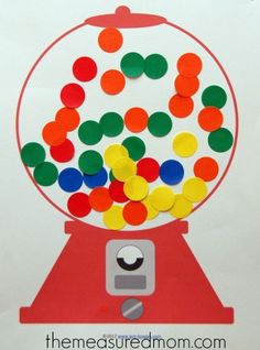 a paper gummy machine with lots of colorful circles in it's top and bottom