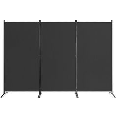 a room divider with three black poles