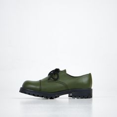 Green Widgets  are no-nonsense unisex shoes made of genuine leather. They are manufactured in Europe according to the NATO AQAP 2110 standard by the same factory making one of the most legendary military boots, M77s. The same manufacturer has also worked with well-known brands, including Dr. Martens  and  Rossignol . So you can be assured they have military-grade quality and robustness. The name of the shoes, Widgets, comes from the hipster area in Tartu, Estonia, where the shoe factory is locat Tartu Estonia, Shoe Factory, Jean Short Jumpsuit, Masquerade Costumes, Designer Studio, Military Boots, Unisex Shoes, Women's Shapewear, Green Shoes