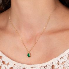 This tiny Emerald is lush and beautiful with a vibrant green. We honored the natural beauty of this gemstones by encasing it in an intricate frame of gold. One of a kind. Technical Details Metal: 18k yellow goldEmerald: 1.88 cts. Pendant Size (not including bail): 10mm x 8.5mmChain: can be worn at 16" and 18"Closure: lobster claspHandmade in New YorkStyle # N-3310-EM Cheap Green Round Pendant Jewelry, Yellow Gold Plated Emerald Necklace, Fine Jewelry Yellow Gold-plated Emerald Necklace, Yellow Gold-plated Emerald Necklace Fine Jewelry, Yellow Gold-plated Emerald Necklace, Exquisite Green Oval Emerald Necklace, Exquisite Oval Green Emerald Necklace, Round Gold Plated Emerald Necklace, Gold Plated Round Emerald Necklace