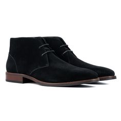 The Aldwin dress chukka boot is an elegant and stylish choice that will elevate any formal look. Crafted from premium quality suede, this lace-up boot offers a luxurious feel and ensures a neat fit for the modern gentleman. With its sleek design and superior craftsmanship, the Aldwin boot adds a touch of sophistication to your wardrobe. Perfect for any formal occasion, these boots combine comfort and style, making them a must-have for those who appreciate refined footwear. Suede Lace-up Chukka Boots For Work, Formal Suede Lace-up Boots With Plain Toe, Classic Lace-up Chelsea Boots For Formal Occasions, Lace-up Chelsea Boots With Leather Sole For Formal Occasions, Elegant Lace-up Boots For Semi-formal Occasions, Black Suede Plain Toe Chukka Boots, Black Suede Chelsea Boots For Business, Formal Black Suede Chelsea Boots, Elegant Suede Chukka Boots For Formal Occasions