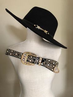 A vintage 1980's Michael Morrison belt. MX Inc. Michael Morrison was a leather designer label founded in 1985. He was best known for his over the top bedazzled belts and studded leather bibs mostly purchased and worn by celebrities. This belt is 46" in length from tip to tip. Leather with rhinestones galore. Heavy gold tone buckle and tip.   *Some slight imperfections do to wear* Bedazzled Belts, Rhinestone Belt Buckle, Performance Outfits, Designer Label, Rhinestone Belt, Designer Belt, May 2023, Suspender Belt, Studded Leather