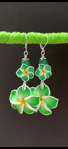 Genuine Jade Stones * * Handmade in Hawaii * * Sterling Silver ear wires * * Order comes with gifts Green Flower-shaped Earrings For Beach, Green Flower-shaped Beach Earrings, Green Adjustable Dangle Flower Earrings, Handmade Green Dangle Flower Earrings, Jade Stone, Flower Earrings, Sterling Silber, Ear Wires, Jewelry Earrings Dangle