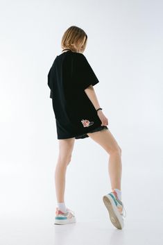 Elevate your everyday style with the B&W T-Shirt (Black) from +YNG. This classic unisex T-shirt is designed for both men and women, making it a versatile addition to any wardrobe. Whether you're grabbing coffee, heading to the office, or embarking on an adventure, this T-shirt is perfect for any occasion. Key Features: * Material: Made from 100% natural, high-quality cotton for ultimate comfort and breathability. * Design: Classic fit with elongated sleeves for a modern twist. * Colors: Availabl Black T-shirt For Spring Streetwear, Black Oversized Sporty T-shirt, Black Relaxed Fit T-shirt For Spring, Streetwear T-shirt With Back Print And Short Sleeves, Hip Hop Cotton Short Sleeve T-shirt, Short Sleeve T-shirt With Back Print For Streetwear, Casual Cotton T-shirt For Concert, Spring Cotton T-shirt For Streetwear, Casual Graphic Print T-shirt For Concerts