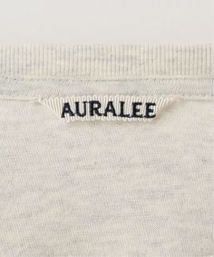 an image of the word auralie on a white t - shirt with black lettering