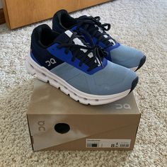 On Women’s Cloudrunner, Chambray/Midnight, Size 8 -Brand New With Box -Never Worn Navy Cushioned Running Shoes For Jogging, Navy Running Shoes With Cushioned Footbed For Jogging, Navy Running Shoes With Cushioned Footbed, Blue Running Shoes With Ortholite Insole For Errands, Casual Navy Cushioned Running Shoes, Navy Running Shoes With Air Cushioning, Navy Running Shoes With Air Cushioning And Round Toe, Casual Blue Trail Running Shoes For Jogging, Blue Trail Running Sneakers In Athleisure Style