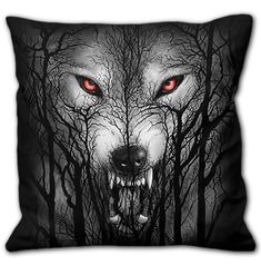 a black and white pillow with red eyes