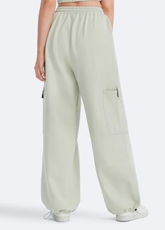 Embrace roomy wide legs and a stretchy fit for ultimate comfort, paired with a flattering high waist for added style. Whether it's grocery runs, lazy Sundays, or a casual hangout, these joggers have you covered in relaxed elegance. Leisure Solid Color Wide Leg Pants With Pockets, Leisure Solid Wide Leg Pants With Pockets, Wide Leg Pants With Pockets For Elevated Casual, Relaxed Fit Wide Leg Lounge Pants With Cargo Pockets, Casual Wide Leg Pants With Side Pockets For Loungewear, Solid Color Wide-leg Relaxed Fit Joggers, Comfortable Wide Leg Sweatpants For Elevated Casual Wear, Wide Leg Bottoms With Comfort Waistband For Elevated Casual, Wide Leg Pants For Elevated Casual Wear