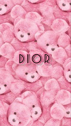 pink teddy bears with the word dior on them