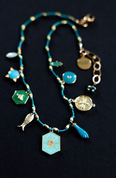 Green Bohemian Jewelry With Charms, Adjustable Blue Charm Necklaces, Adjustable Blue Necklaces With Charms, Spiritual Turquoise Necklace With Lobster Clasp, Blue Jewelry With Dangling Charms, Bohemian Green Necklaces With Charms, Blue Dangle Charm Necklaces With Lobster Clasp, Blue Pendant Jewelry With Dangling Charms, Blue Dangle Charm Necklace With Lobster Clasp