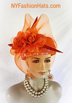 "Women's Haute Couture Orange And Pink Big Bow Statement Pillbox Designer Wedding Bridal Hat. This Couture Custom Made Special Occasion Hat Is Embellished With A Large Sheer Orange Horsehair Crinoline Bow. Placed Inside This Ornate Handmade Bow Are Silk And Organza Large Open Flowers. Handmade Large Vintage Silk Orange Pointed Flower Petals Are Also Arranged Within This Fabulous Bow. A Beautiful Multi Colored Orange And Pink Iridescent Thick Sequin Trim Encircles The Lower Portion Of The Crown O Elegant Orange Fascinator For Wedding, Orange Fitted Headpiece For Kentucky Derby, Orange Adjustable Mini Hats For Wedding, Adjustable Orange Mini Hat For Wedding, Adjustable Orange Mini Hats For Weddings, Wedding Mini Hat In Orange With Adjustable Fit, Orange Adjustable Headpieces For Wedding, Orange Adjustable Wedding Headpieces, Adjustable Orange Headpieces For Wedding