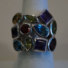 Nwt Sterling Silver (.925) Multi Stone Ring With Amethyst, Blue Topaz, Citrine, Garnet, And Peridot. Ring Is Available In A Size 6 And 7. Multicolor Fusion Style Jewelry With Accent Stones, Multicolor Fusion Jewelry With Accent Stones, Blue Multi-stone Fusion Gemstones, Multicolor Multi-stone Gemstones In Sterling Silver, Multicolor Sterling Silver Fine Jewelry Gemstones, Multicolor Multi-stone Amethyst Ring In Sterling Silver, Multicolor Multi-stone Sterling Silver Gemstones, Round Multi-stone Sterling Silver Gemstones, Round Multi-stone Gemstones In Sterling Silver