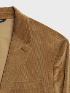 ITALIAN CORDUROY: Soft and textured, this skinny-wale corduroy is perfect for cooler weather.  2-3 BUTTON FRONT: Three-button front is pressed so you can also wear it as a two-button jacket.  SOFTLY STRUCTURED: Minimal padding at the shoulders, unlin Fitted Corduroy Business Outerwear, Tailored Single-breasted Corduroy Outerwear, Classic Corduroy Outerwear With Notch Lapel, Brown Corduroy Blazer With Button Closure, Casual Corduroy Blazer With Button Closure, Casual Corduroy Blazer For Business, Classic Corduroy Business Outerwear, Button-up Corduroy Blazer With Button Closure, Corduroy Button-up Blazer With Button Closure