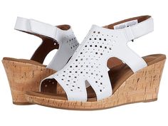 Rockport Briah Hood Sling - Women's Sandals : White : Get your summer flowing in the perforated leather Rockport Briah Hood Sling open-toe wedge sandal. Features on-trend side cutouts and an adjustable hook-and-loop fastener at heel strap. Soft and breathable textile linings. Generously cushioned footbed for added comfort. Cork-wrapped wedge on a durable rubber outsole. Imported. Measurements: Heel Height: 2 1 2 in Weight: 10 oz Platform Height: 1 2 in Product measurements were taken using size Casual Sandals With Perforations In Synthetic Material, Casual Synthetic Sandals With Perforations, Casual Sandals With Perforations, Spring Leather Slingback Sandals With Arch Support, Spring Synthetic T-strap Slingback Sandals, Spring Leather Sandals With Perforated Toe, Spring T-strap Slingback Sandals With Removable Insole, Synthetic Sandals With Perforations For Summer, Summer T-strap Slingback Sandals With Arch Support