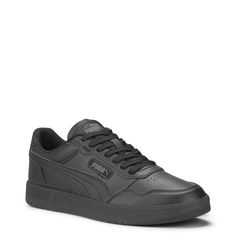 Timeless sporty style infused with classy vibes in these men's Court Ultra puma black shadow grey sneaker. It is designed with a leather and faux leather upper, made with sustaible materials, lace-up design, roud toe fit, textile lining, Softfoam+ sockliner and a rubber midsole and outsole. | Puma Men's Court Ultra Sneaker in Black/Shadow Grey Size 8 Medium Classy Vibes, Black Shadow, Shoe Company, Puma Mens, Grey Sneakers, Puma Shoes, Sole Shoes, Pumas Shoes, Boots And Sneakers