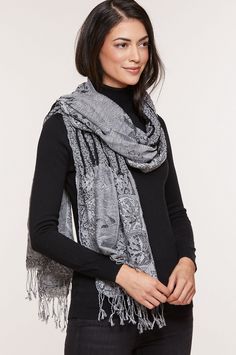 The perfect finish to your outerwear or indoor outfit, our ruffle shawl steals the show. Wear it for breezy evenings or air conditioned indoor spaces or for adding color to your presentation. This feminine styled shawl is crafted of 50% cotton and 50% rayon with a fun fusion of patterns, a stretchy ruffle design, and a fine 4" fringe. And wearing it on the reverse side gives you added variations. It packs easily in your tote or carry-on so you're never without it, and makes an ideal gift. Pashmina Shawl One Size, Elegant Spring Pashmina Shawl, Elegant Wrap Scarves For Winter, Elegant Pashmina Shawl For Spring, Cotton Shawl For Fall, Cotton Shawl Scarves For Fall, Spring Pashmina Shawl Scarf, Pashmina Scarves, Ruffle Design