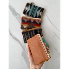 Our long time best selling wallet. This little single pocket pouch will hold money, cards and small items safely zipped up for the minimalist. It has Leather cow hide on the back side and genuine Pendleton®wool (blanket weight) on the front, lined with natural canvas, equipped with a durable brass YKK zipper and sturdy leather pull. 5.5” x 3.5” *each Pendleton pattern will vary slightly SHIPS IN 7-10 BUSINESS DAYS Rectangular Brown Coin Purse With Zipper Pocket, Brown Rectangular Coin Purse With Zipper Pocket, Brown Wallets With Zipper Pocket For Everyday Use, Brown Wallet With Zipper Pouch, Rectangular Zipper Pouch Wallet, Everyday Rectangular Wallets With Zipper Pouch, Brown Coin Purse With Zipper Pocket For Everyday Use, Brown Zipper Coin Purse, Brown Wallets With Zipper Pocket