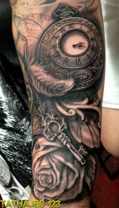 a woman's arm with a clock and roses on it