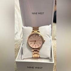 Brand New Rose Gold Women’s Watch From Nine West Domed Mineral Crystal Lens Pink Dial With Rose Gold-Tone Hands And Crystal Accented Markers Rose Gold-Tone Adjustable Link Bracelet; Fold Over Clasp With Double Push-Button Safety Not Water Resistant Titan Watches For Women, Nike West, Rose Gold Watches Women, Gold Watches Women, Rose Gold Watches, Rose Gold Watch, Rose Gold Color, Minerals Crystals, Push Button