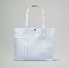 Lulu Tote Bag, Sporty Everyday Bags With Functional Pockets, Functional Tote Bag With Multiple Pockets, Sporty White Bag With Pockets, Daily Use Tote Bag With Functional Pockets, Functional White Shoulder Bag With Pockets, Tote Bags With Functional Pockets For Daily Use, Functional Everyday Bags With Multiple Pockets, Casual Tote Bags With Functional Pockets