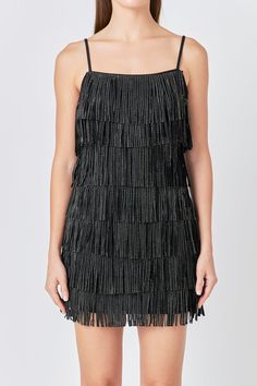 This Embellished Faux Suede Fringe Mini Dress is perfect for a night out on the town. With its sleeveless design, fringed detail, and embellished accents, this dress is sure to turn heads. Whether you're hitting up a club or going to a fancy dinner, this mini dress is a great choice. You'll look and feel fabulous in this amazing dress. Faux suede Adjustable straps Fringe detail torso Mini length Sleeveless Lined Hand wash cold Do not bleach Do not tumble dry Do not dry clean Do not iron Shell: 5 Suede Mini Dress, Black Fringe Dress, Fringe Mini Dress, Rhinestone Dress, Fancy Dinner, Fringe Dress, Suede Fringe, Black Fringe, Hip Length