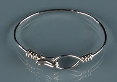 Beautifully hand-forged and fabricated from heavy gauge sterling silver wire, this hammered hook & eye bracelet is easy on, easy off.  So comfortable and pretty, you'll never want to take it off. Please be sure to specify your wrist size. Cedar City, Wrap Jewelry, Hook And Eye, Eye Bracelet, Hook Eye, Wire Wrap, Hand Forged, Wire Wrapped Jewelry, Silver Wire